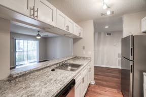Kitchen with Stainless Steel Appliances  | Lakes at Suntree