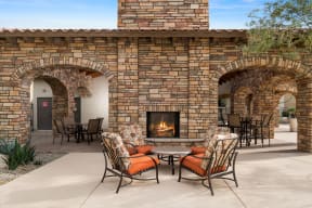 Outdoor fireplace and lounge area