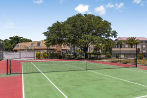 Challenge friends to a match on the community tennis court |Brittany