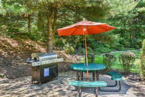 Enjoy a meal with friends in the community picnic area with grill |Residences at Westborough