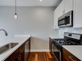 White Cabinets In Kitchens At Boutique 28 Apartments In Minneapolis, MN