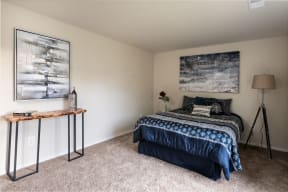 Bedroom with cozy bed at The Glendale Residence Apartments, Lanham