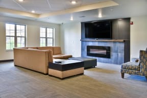 Community Room with Large TV and Couches