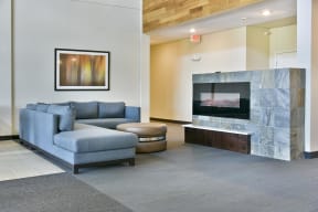 Lobby Lounge with Couch and Fireplace