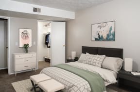 Bedroom with Bed and Walk in Closet
