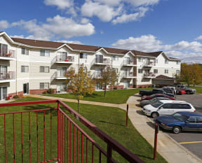 Exterior Grand Gateway Balconies and Parking Lot with Cars