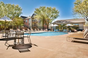 Outdoor Pool and Sundeck with Chairs