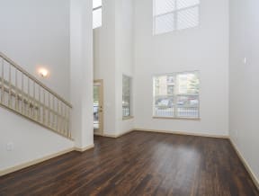 Multilevel unit with high ceilings, plenty of natural light from +3 windows, and gorgeous wood flooring.