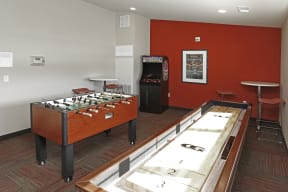 Game Room with Foosball and Shuffleboard Tables