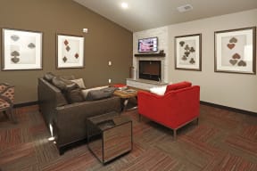 Fireside Lounge with TV, Fireplace and Chairs