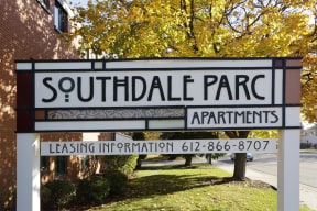 Southdale Parc monument sign with autumnal trees in the background.