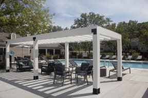 Pool Sundeck with Pergola and Lounge Chairs