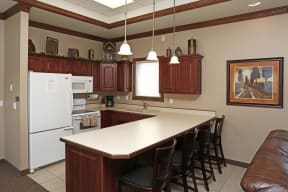 Full kitchen with a large peninsula perfect for entertaining.
