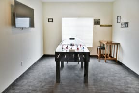 Game Room with FoosHockey Table and TV