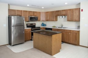 Spacious kitchens with stainless steel appliances and tons of cabinet space.