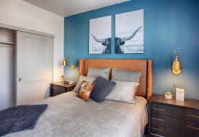 Bedroom with Bed, Nightstands and Blue Accent Wall