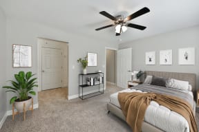 Bedroom with Bed and Fan