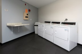 On site laundry facilities with counter space.