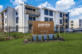 View of Parea Oak Lawn Exterior Showing Sign and Newly Renovated Exteriors