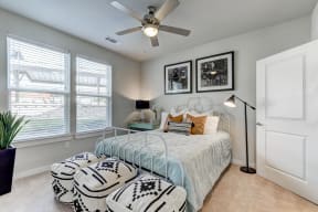 Model Bedroom with Ceiling Fan and Connecting Bathroom
