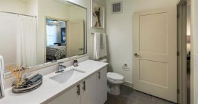 On-suite bathrooms adjacent to master bedroom at 2000 West Creek Apartments, Virginia, 23238