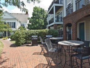Tables and grill at Times Square Apartments in Dublin OH