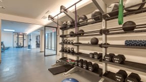 24-Hour Fitness Center With Free Weights at Residences at Richmond Trust, Richmond