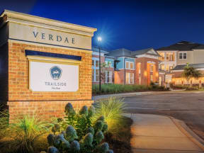 Trailside Verdae Apartments entrance sign surrounded by flowers