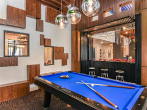 Pool table room separated from Coda Orlando clubhouse spaces in Orlando, FL apartment rentals