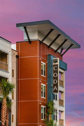 Shot of Coda Orlando signage attached to apartment building in Orlando, FL