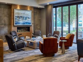 Posh Berewick Pointe Lounge Area With Fireplace In Clubhouse in North Carolina Apartment Rentals