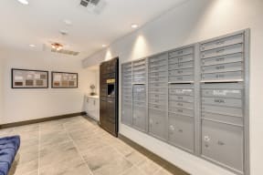 Mail delivery room with parcel lockers and mailboxes.