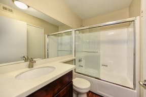 Bathroom with Shower, Countertop and Toilet