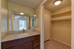 Bathroom and Walk In Closet, Cabinets, Vanity and Carpet
