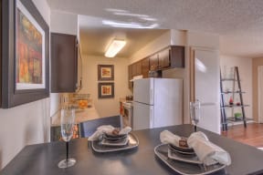 Dining Area Kitchen with Hardwood Floor Wood Inspired Floors Refrigerator Dishwasher