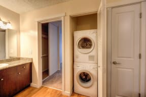 In Unit Washer Dryer and Bathroom Vanity with Hardwood Inspired Floor