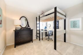 Bedroom with Bunk Bed, Carpet, White Desk, Black Dresser and Window