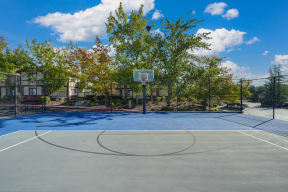 Rocklin manor Sports court with basketball hoop and tennis court