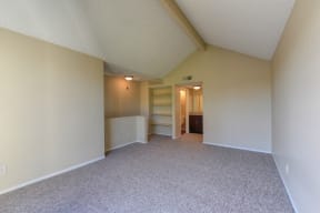 Bedroom with Vaulted Ceiling, Carpet and Window 