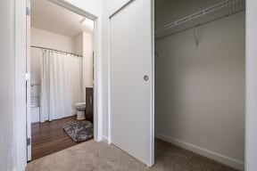 Closet with bathroom nearby