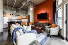 living space and kitchen in an East End Lofts apartment unit in Houston