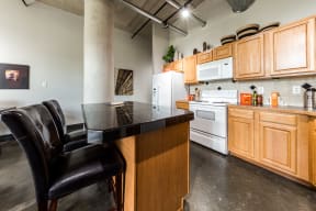 kitchen with an island in an East End Lofts apartment unit