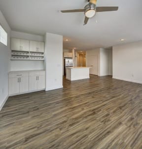 living room with a view of the kitchen at Brixton South Shore, Texas, 78741
