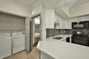 kitchen white countertops with laundry room