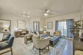 living room with office space in the back