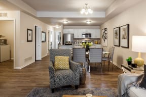 living room overview with kitchen sight