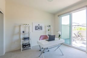 Living room with over-sized windows and lots of natural lighting