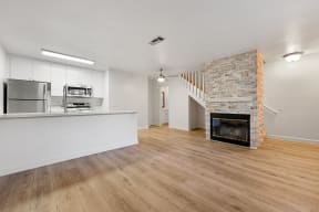 Kitchen near living room and fireplace 
