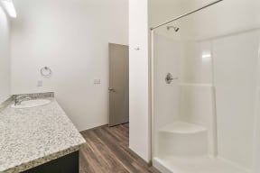 Crescent Point bathroom with vanity and full shower and tub