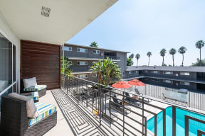Balcony over looking the pool  l Emerald Hills Apartments in Monterey Park